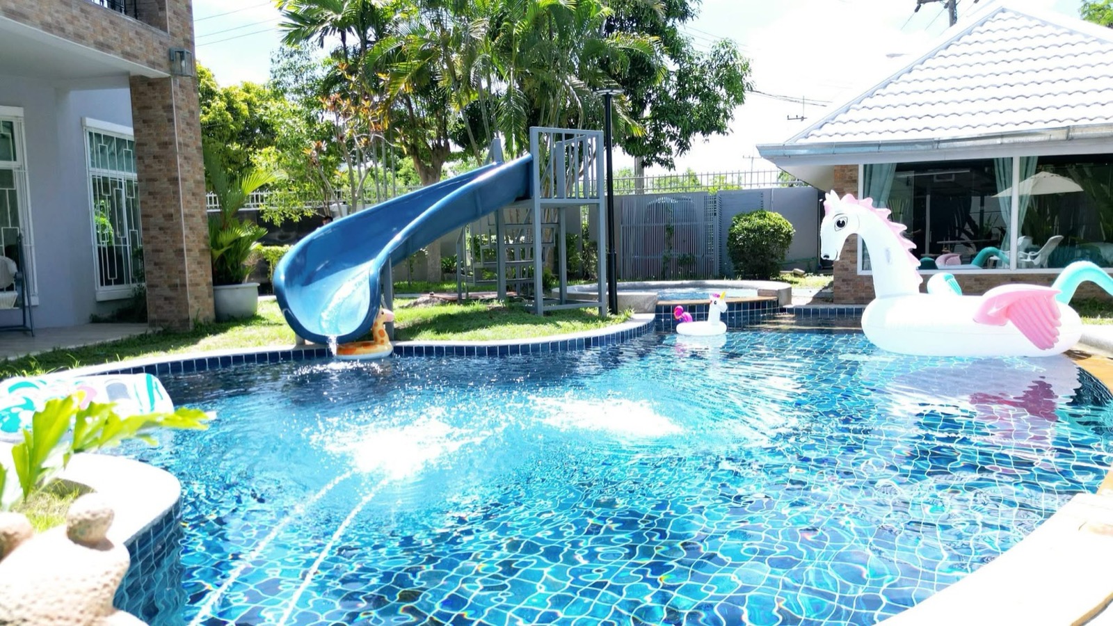 Water slide and fun floats in the pool